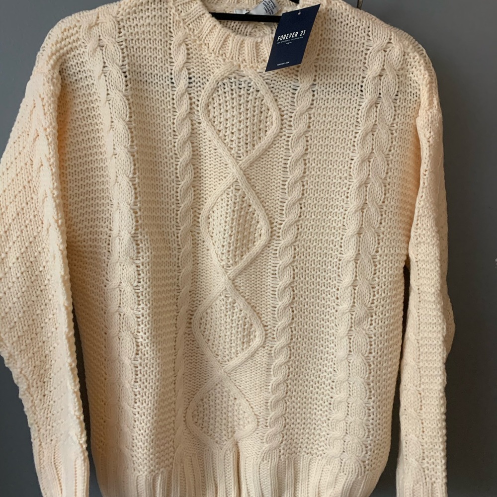 Cable knit, crew neck sweater